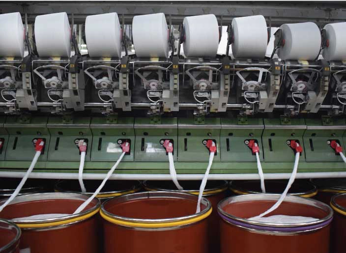 Polyester ring-spun yarn manufacturing process